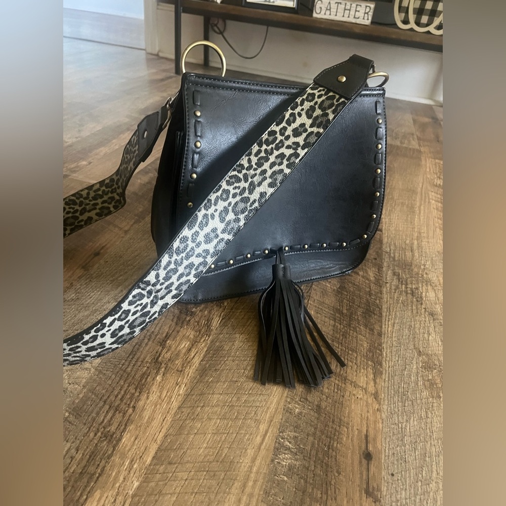 Elegant Black Crossbody Bag with Leopard Guitar Strap and Tassel